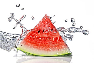 slice of watermelon and water