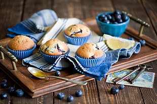 four baked cupcakes, muffins, food, spoons, keys HD wallpaper