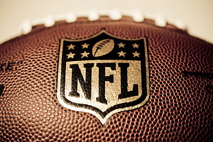 brown NFL pigskin football HD wallpaper