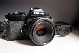 black Nikon DSLR camerea HD wallpaper