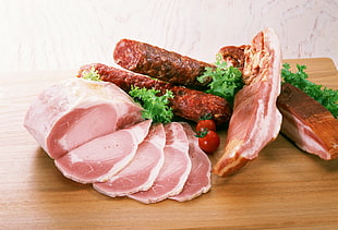 five several cooked meat on brown wooden board