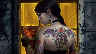 woman wearing dress and floral tattoo painting