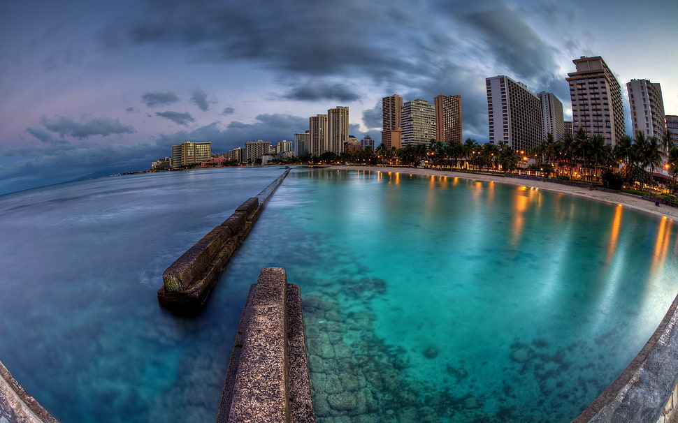 fish eye lens photography of calm body of water near high-rise building, city, cityscape, sea, reflection HD wallpaper