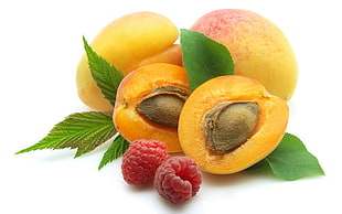 two lychees near two apricots