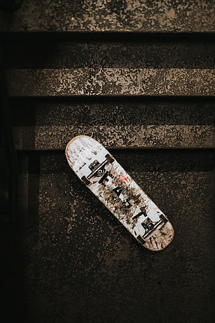 white and black skateboard