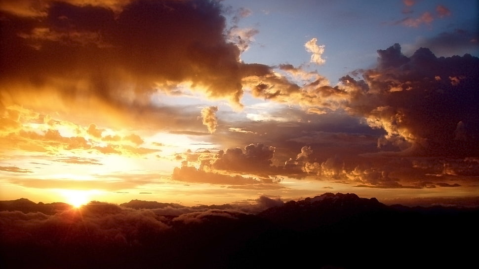 mountains during golden hour HD wallpaper