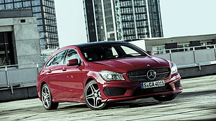 red Mercedes-Benz C-Class on road