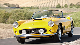 classic yellow Ferrari convertible coupe