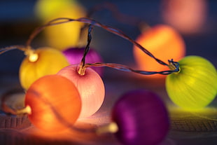 selective focus photography of string lights