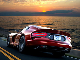 photo Dodge Viper on road near ocean during golden hour