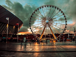 orange and white Ferris wheel, Liverpool, dusk, lights