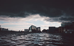 body of water, cityscape, clouds, water
