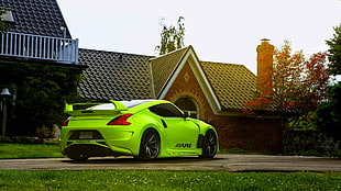 green coupe park infront on the house HD wallpaper