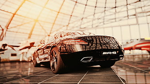 black Mercedes-Benz sports car in close-up photography
