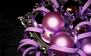 closeup photo of purple baubles