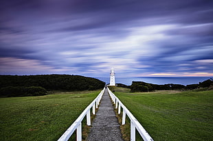 photo of white lighthouse during daylight