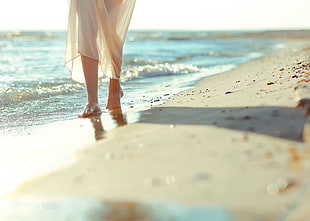 women's white maxi skirt, beach, barefoot, see-through clothing