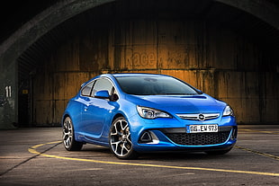 blue Opel Astra coupe
