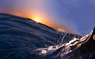 sea wave during sunset HD wallpaper