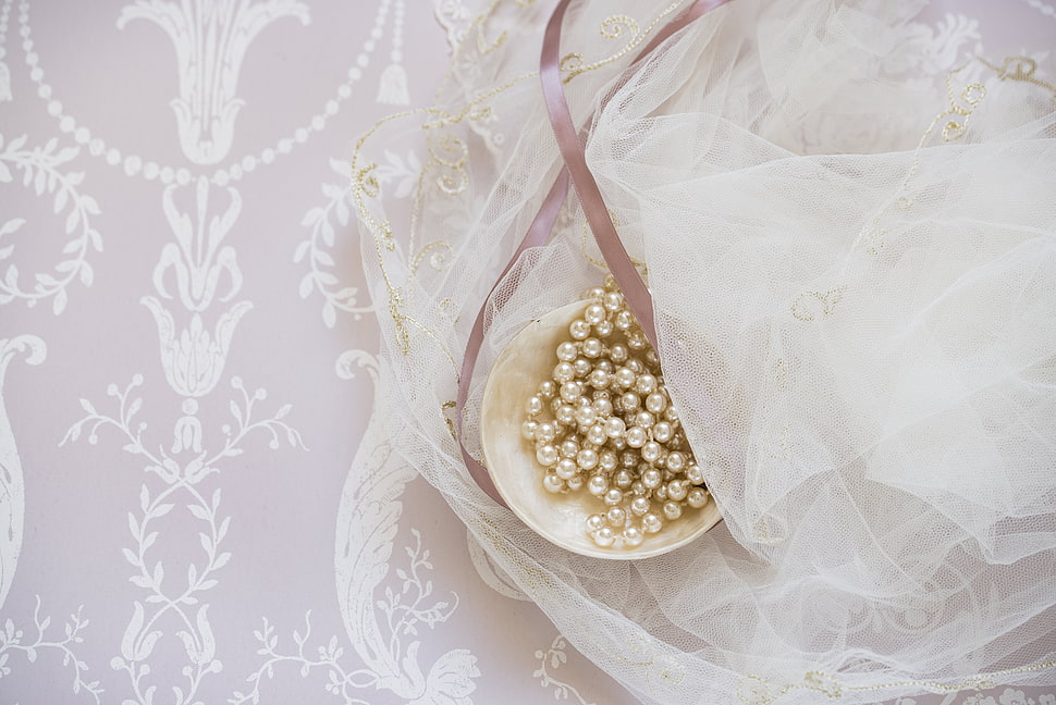 white beaded accessory in white bowl HD wallpaper