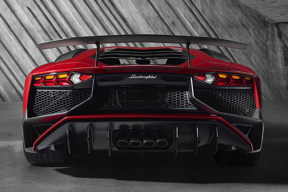 close up photo of a red Lamborghini sports car HD wallpaper