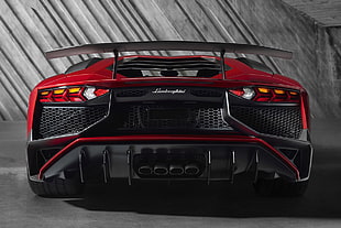 close up photo of a red Lamborghini sports car