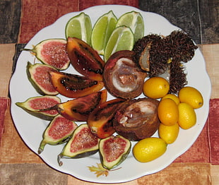 assorted fruits on white ceramic plate
