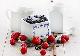 white and blue ceramic bowl near strawberries HD wallpaper
