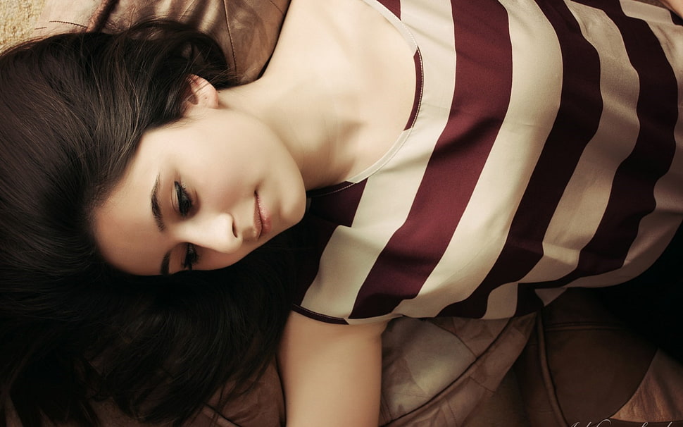 woman in white and red striped shirt lying on bed HD wallpaper