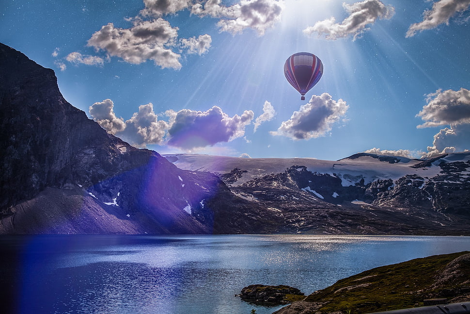 purple hot air balloon, Sun, nature, river, mountains HD wallpaper