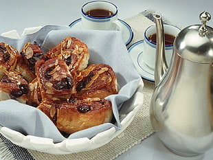 bread with almonds and raisins near silver teapot HD wallpaper