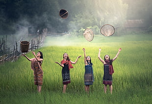 four woman on green grass field HD wallpaper