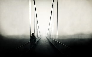 person walking on bridge during fogs HD wallpaper