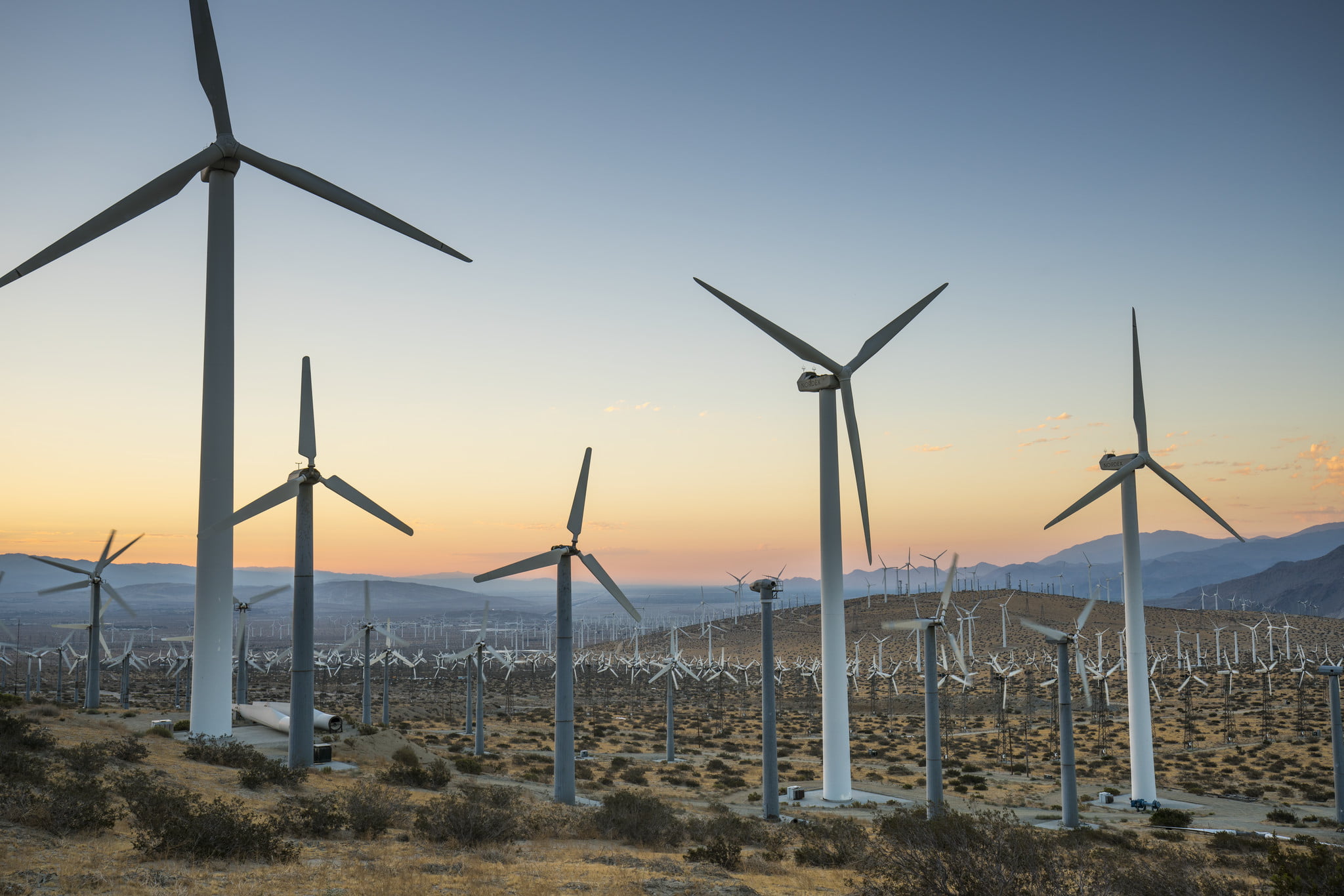 wind turbine lot in a plane field