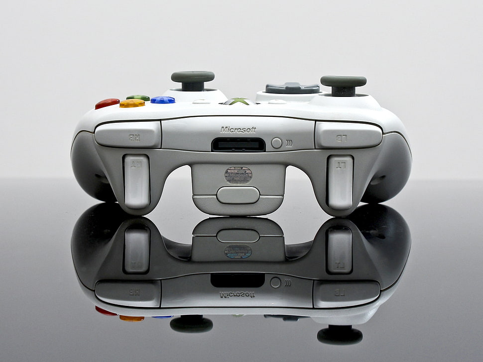 white Xbox 360 wireless controller on black surface HD wallpaper