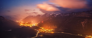 lighted buildings near mountain, landscape, mountains