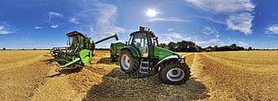 green and black tractor during daytime