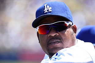 man in blue L.A. Dodgers baseball cap