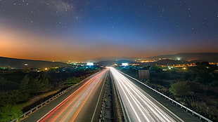 streak light photography of vehicles, long exposure, road, traffic, sky