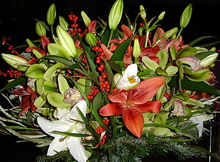 bouquet of white and red petaled flowers