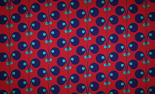 blue and red monogram textile