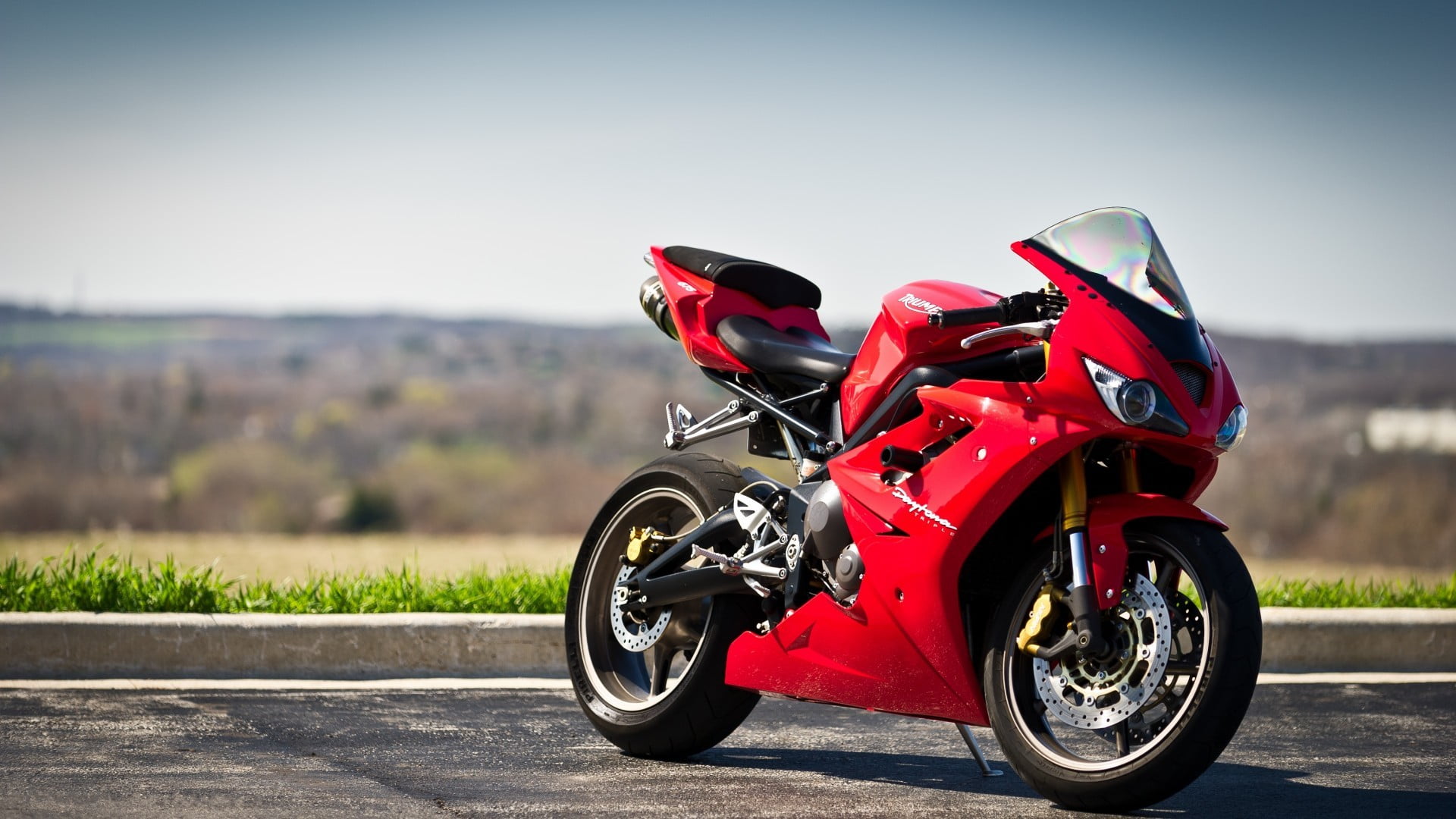 red and black sports bike, Triumph Daytona