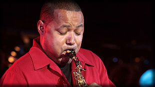 man playing wind instrument