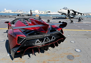 black and red sports car near airplane HD wallpaper