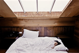 woman sleeping on white mattress HD wallpaper